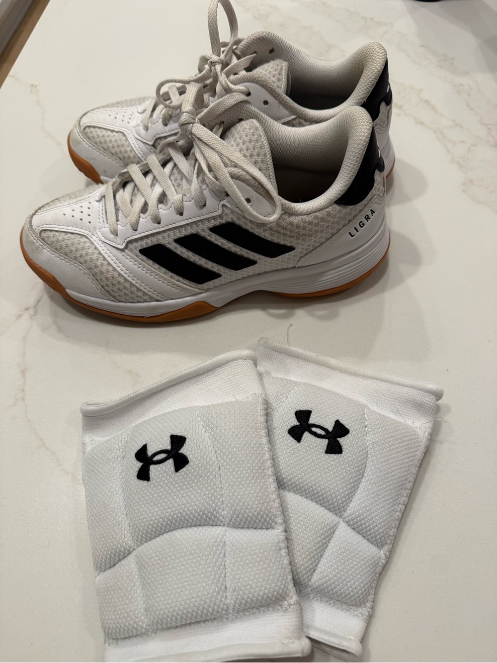 adidas White & Black volleyball shoes with under armor knee pads